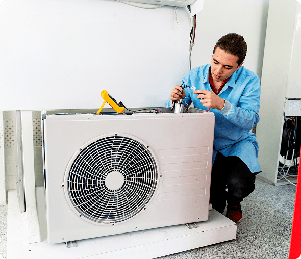 AC repairman working on cooling system
